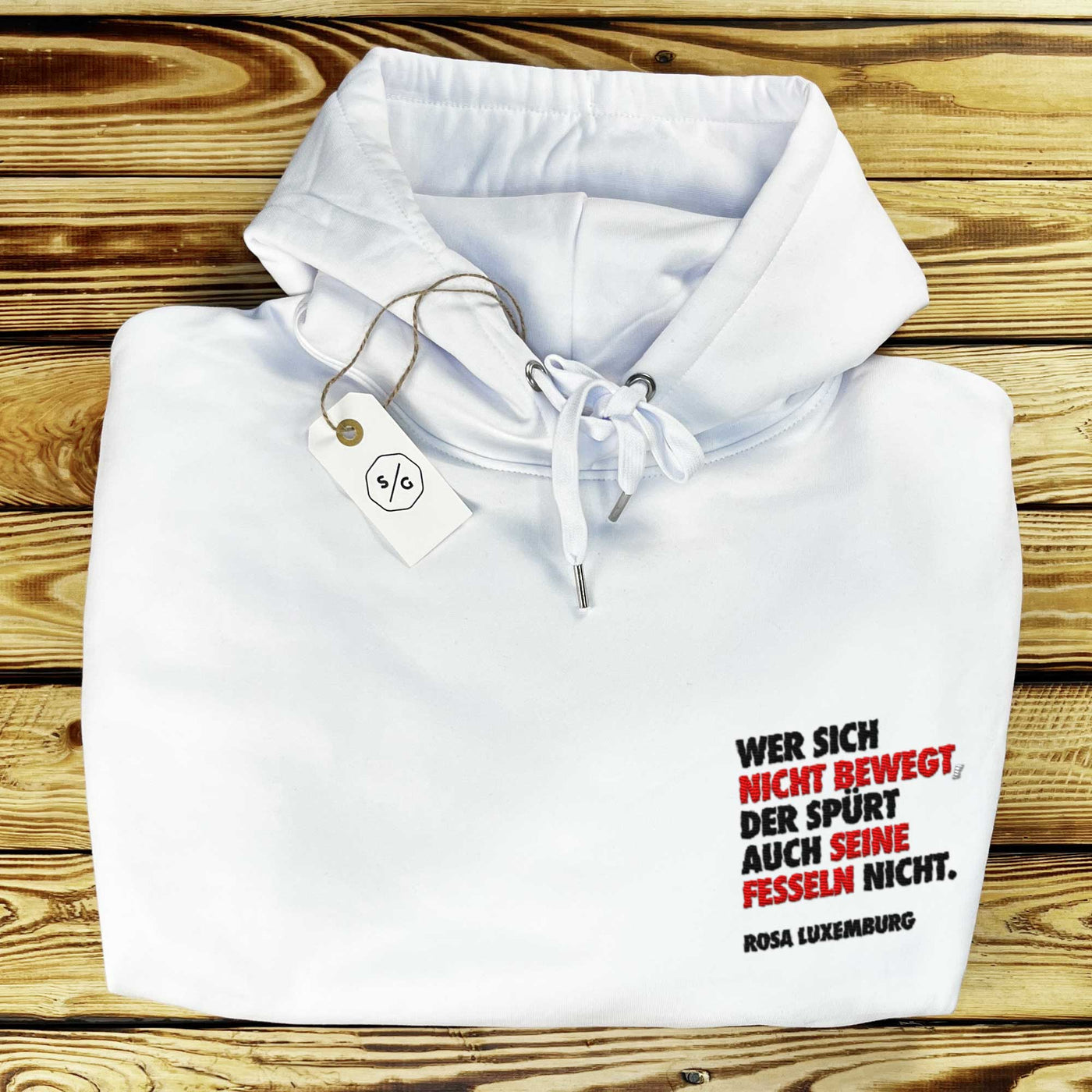 BESTICKTER HOODIE • WER SICH NICHT BEWEGT, DER SPÜRT AUCH SEINE FESSELN NICHT.