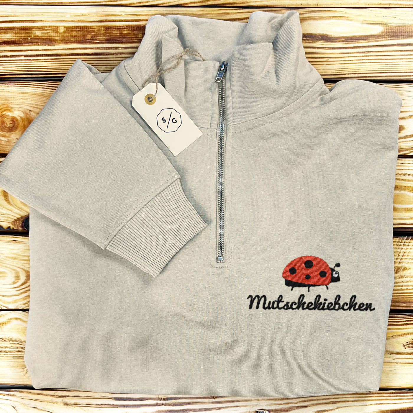 EMBROIDERED HALF-ZIP SWEATER • MUTSCHEKIEBCHEN