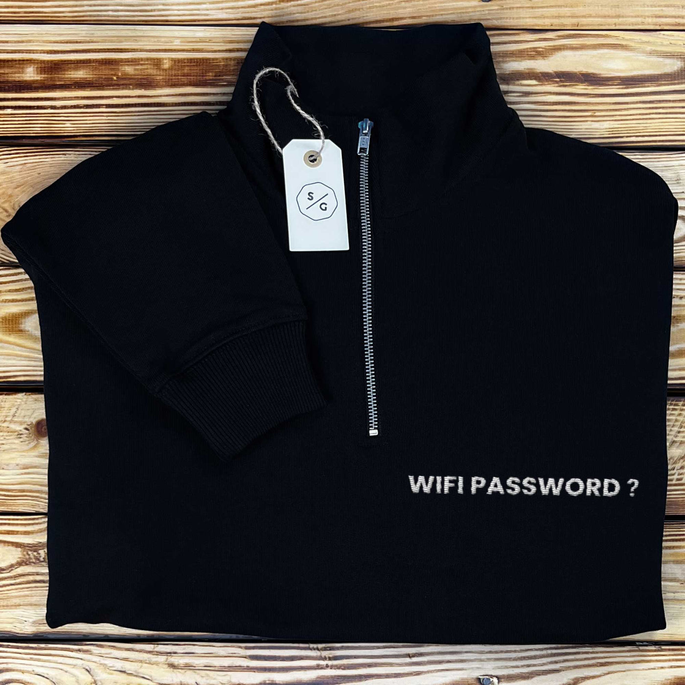 EMBROIDERED HALF-ZIP SWEATER • WIFI PASSWORD?