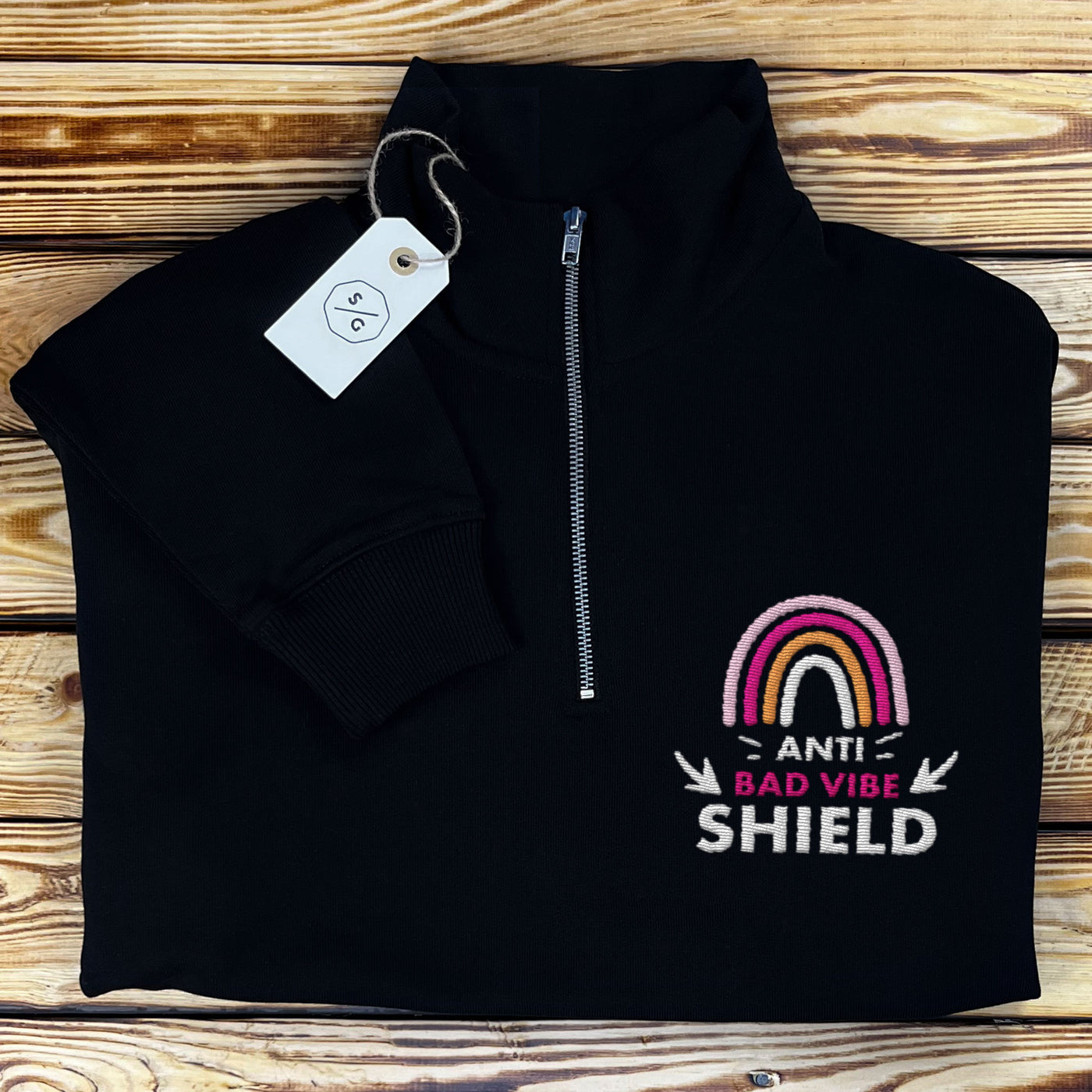 EMBROIDERED HALF-ZIP SWEATER • ANTI BAD VIBE SHIELD