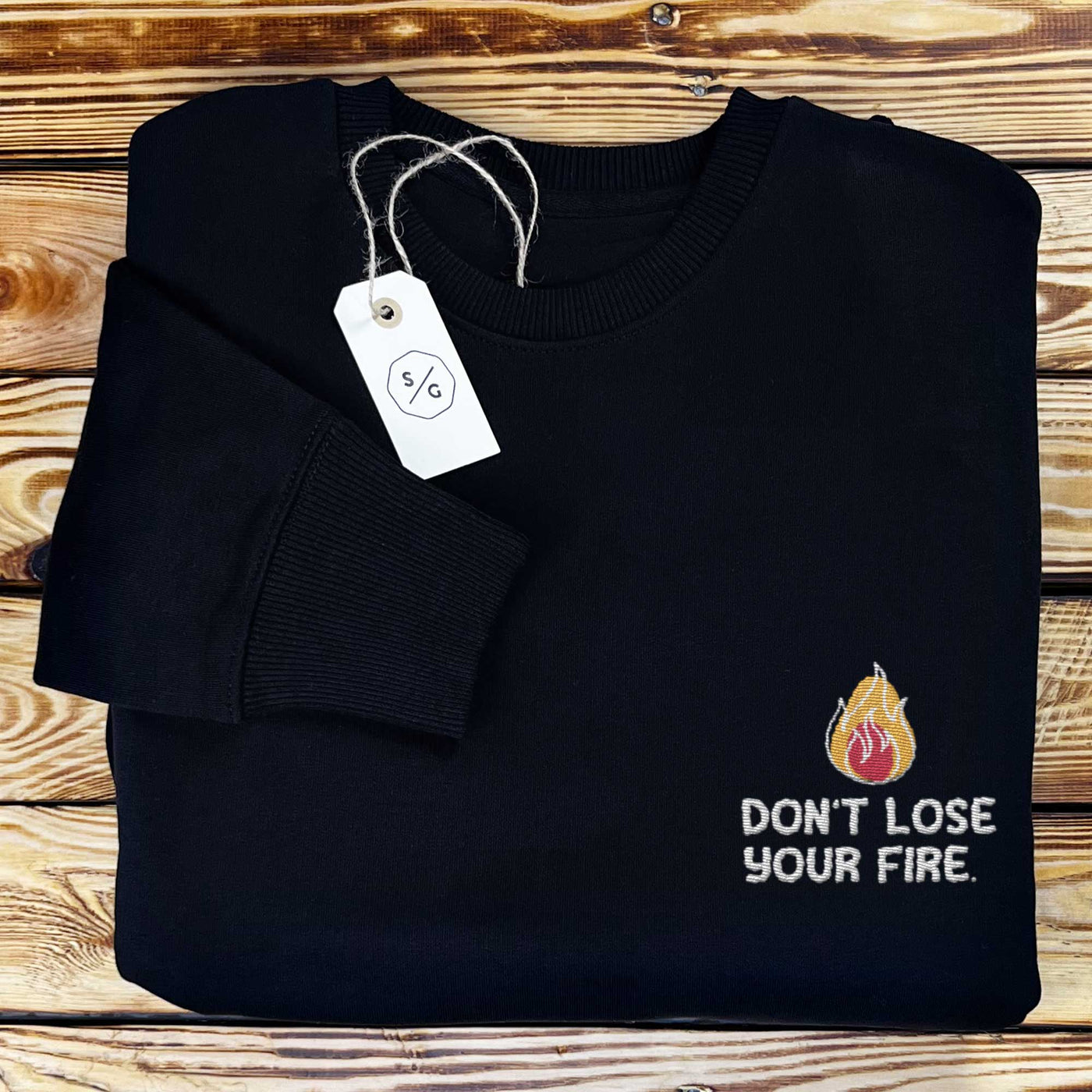 EMBROIDERED SWEATER • DON'T LOSE YOUR FIRE.